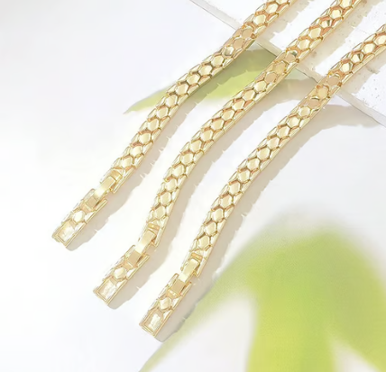 Pulsera de cadena de escamas de serpiente doradas