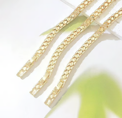 Pulsera de cadena de escamas de serpiente doradas